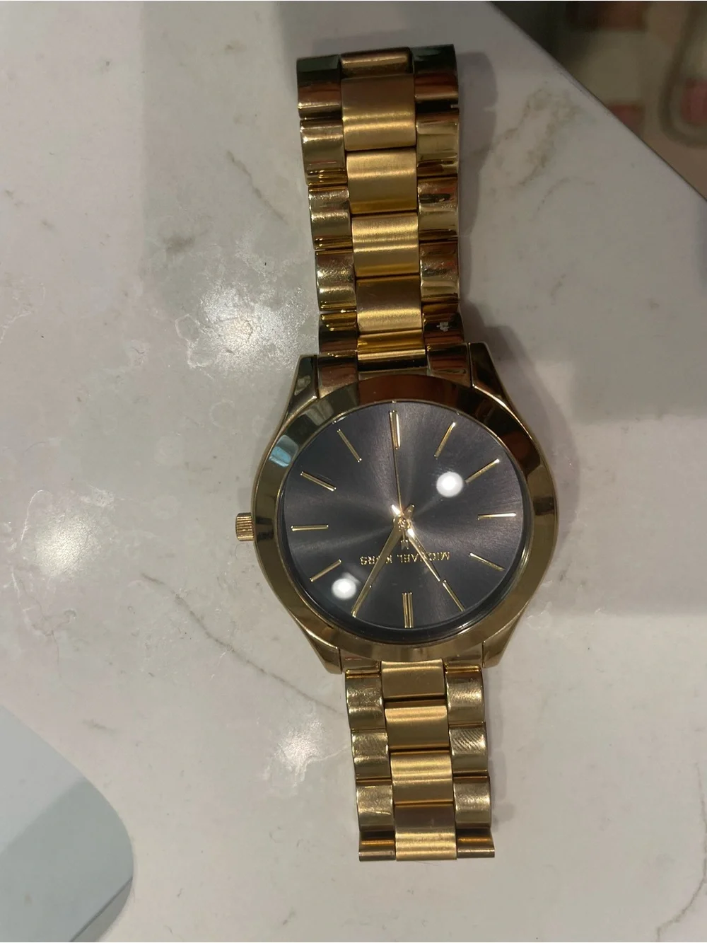 Michael Kors needs batteries
